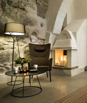 Solino easy chair low back upholstered frame by Swedese - view 2