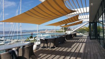 Adjustable Ingenua shade sail by Umbrosa