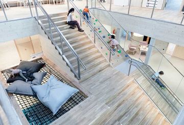 Shed roof | modular skylights and photovoltaic panels by Velux Commercial - view 2