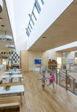 Shed roof | modular skylights and photovoltaic panels by Velux Commercial - view 6