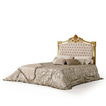 Classic bed with capitonné headboard with a timeless style by Zanaboni
