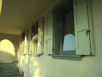 ALU 90 BRONZE - Wood-bronze window by CARMINATI SERRAMENTI