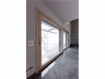 PASSIVE 120 - Aluminium and wood patio door by CARMINATI SERRAMENTI