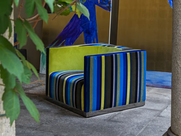 EROS - Fabric armchair with armrests by ERBA ITALIA