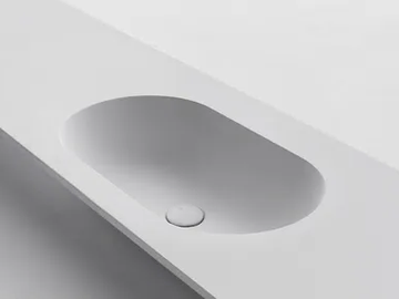 OVAL - Cristalplant® washbasin with integrated countertop by FALPER