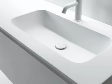 ROUNDLUX - Ceramilux® washbasin with integrated countertop by FALPER