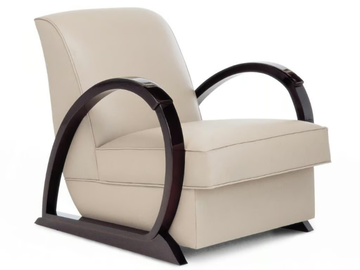 LIBERTY - Sled base upholstered armchair with armrests by HUGUES CHEVALIER