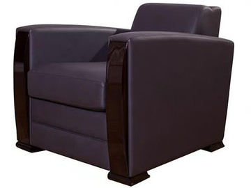 PULLMAN - Upholstered leather armchair by HUGUES CHEVALIER