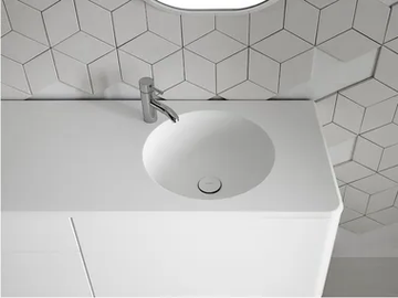 CERCLO - Round single Corian® washbasin with integrated countertop by INBANI