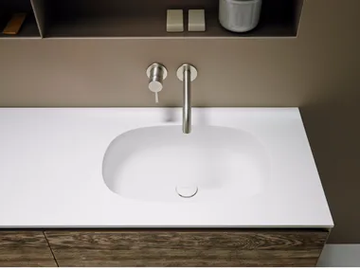OVALO - Corian® washbasin with integrated countertop by INBANI