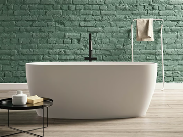 PORTOFINO - Freestanding oval Kstone bathtub by Karol