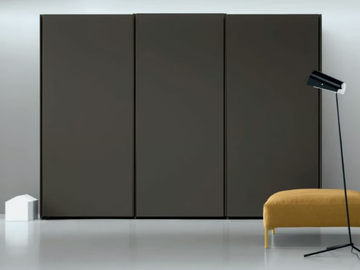 ARIA - Sectional wardrobe with sliding doors by Kristalia