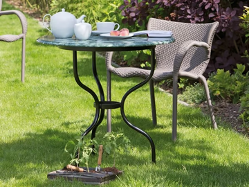 TÊTE À TÊTE - Round marble garden table by Lambert