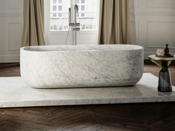DESIGNO - Freestanding oval Carrara marble bathtub by LUSSO