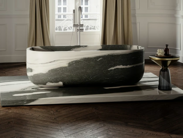 DESIGNO - Freestanding oval marble bathtub by LUSSO