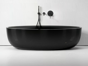 ZURRA - Freestanding oval Resin Stone bathtub by LUSSO