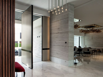 SYNUA - Pivot Laminam® entry door by OIKOS VENEZIA