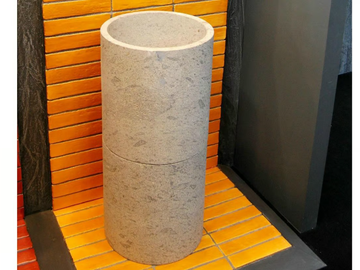 CILINDRO - Freestanding round natural stone washbasin by RAMA 1956