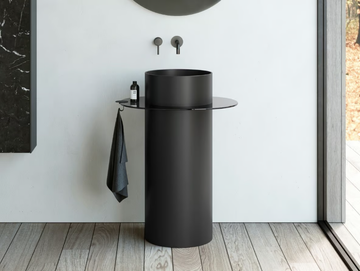 DISCOVOLANTE - Freestanding Corian® washbasin by Rexa