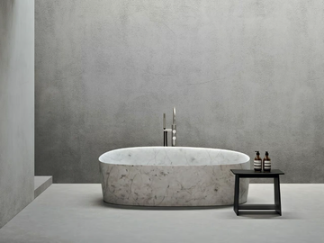 LUNI - Freestanding marble bathtub by Rexa