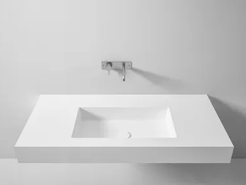 RETTANGOLARE LAVABI - Wall-mounted Korakril™ washbasin with integrated countertop by Rexa