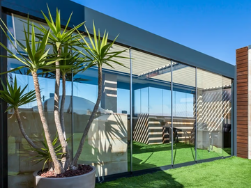 ASTRON - Sliding aluminium glass facade by Saxun