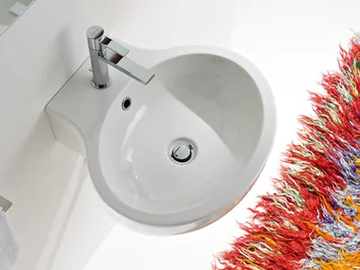 PLANET - Wall-mounted oval ceramic washbasin by Scarabeo Ceramiche