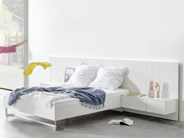 MIRIA 12 - Double bed with integrated nightstands by Sudbrock Möbelhandwerk
