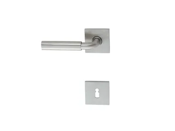 WALTER SCHNEPEL 1988 - Door handle on rose with lock by TECNOLUMEN®
