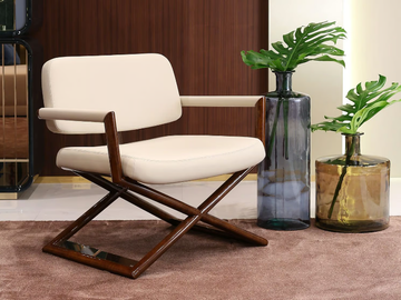MADISON - Upholstered leather easy chair with armrests by Turri
