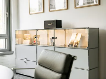 USM HALLER E - Glass and steel sideboard with integrated lighting by USM