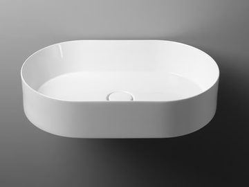 TRACK - Countertop oval single ceramic washbasin by Valdama