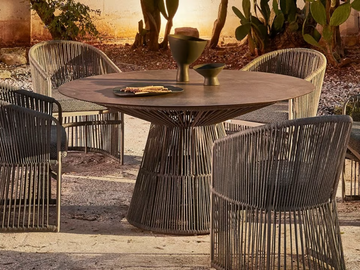 TIBIDABO - Round table with synthetic fiber weaving and glass top by Varaschin