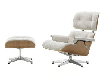 EAMES LOUNGE CHAIR & OTTOMAN NUBIA - Swivel fabric armchair with footstool by Vitra