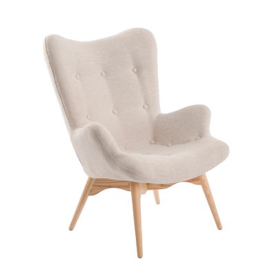 Armchair upholstered in fabric capitone