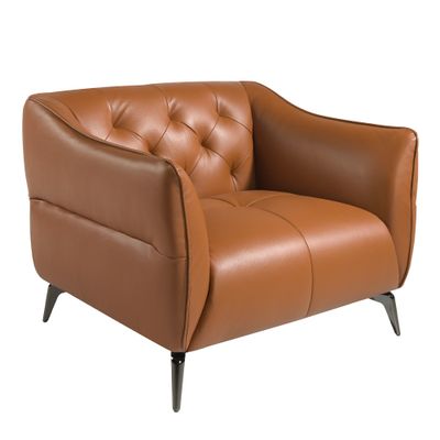 Armchair capitone upholstered in leather