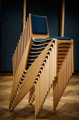 Maximizing Space Efficiency: Stackable Plywood Chairs