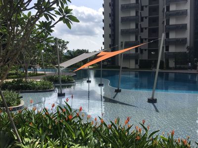 Shade Sails provide sun protection in pool