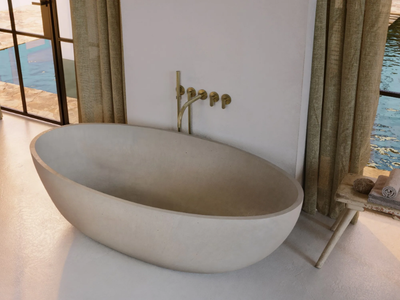 ATLANTIS - Freestanding oval Solid Surface bathtub _ COCOON