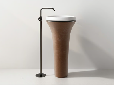 TOSCA - Freestanding round single quarry washbasin _ Karol