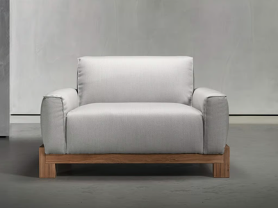 BENTE - Fabric garden armchair with armrests _ Piet Boon