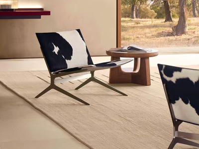 KAY LOUNGE - Cowhide armchair with footstool _ Poliform