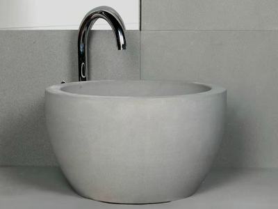 TULIP - Countertop round natural stone washbasin _ RAMA 1956