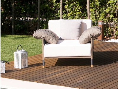 AIRE - Upholstered fabric garden armchair with armrests _ Rever