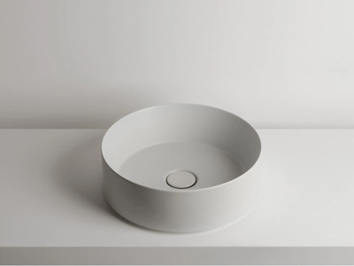 TRACK - Countertop round single ceramic washbasin _ Valdama
