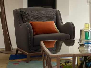 CONTEMPORARY LIVING - Fabric armchair with armrests _ VOLPI