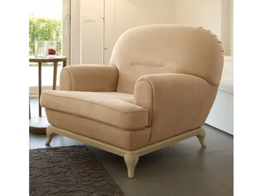 CONTEMPORARY LIVING - Leather armchair with armrests _ VOLPI