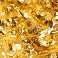 Irregular surface lined with gold coloured leaf